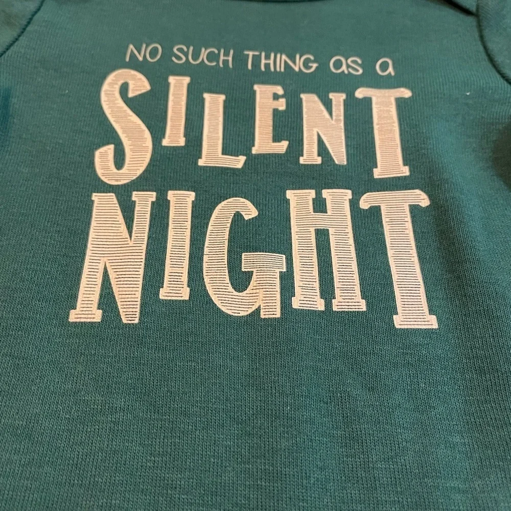 NWT long sleeve onesie “No Such Thing As A Silent Night”